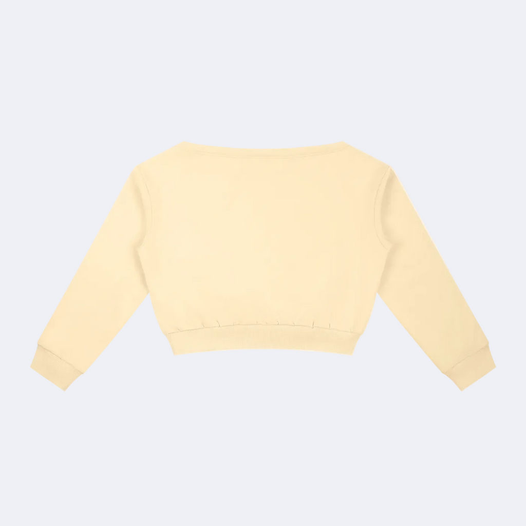 Light yellow crop baby-crew on a white background