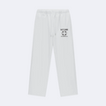 White sweatpants with a logo on a white background